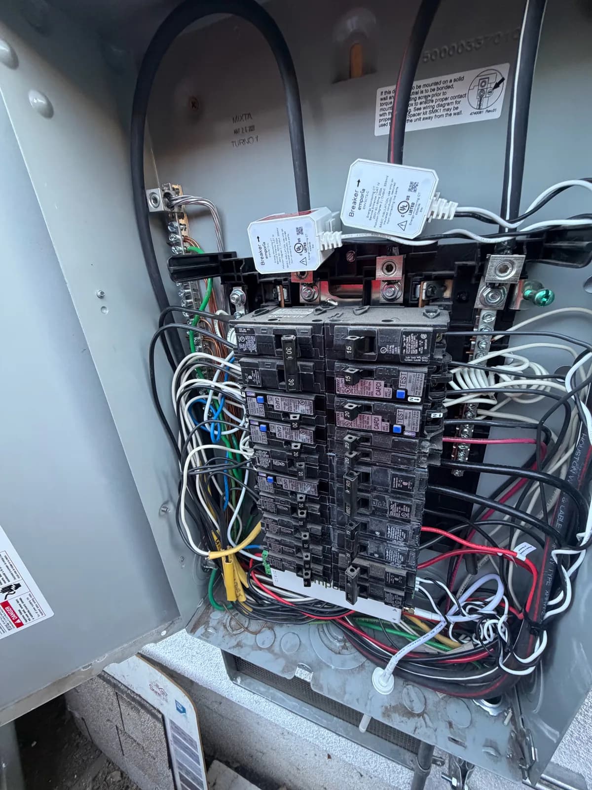 Panel interior with an energy monitor installed by our team