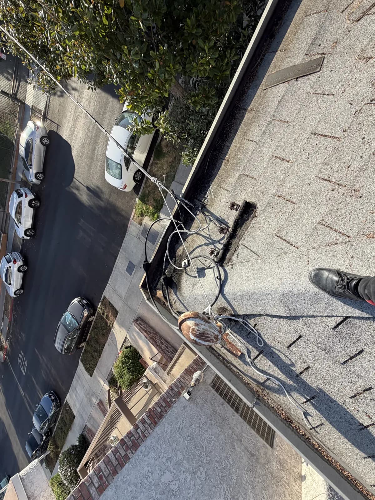 A damaged rooftop service entrance our crew was called out to repair