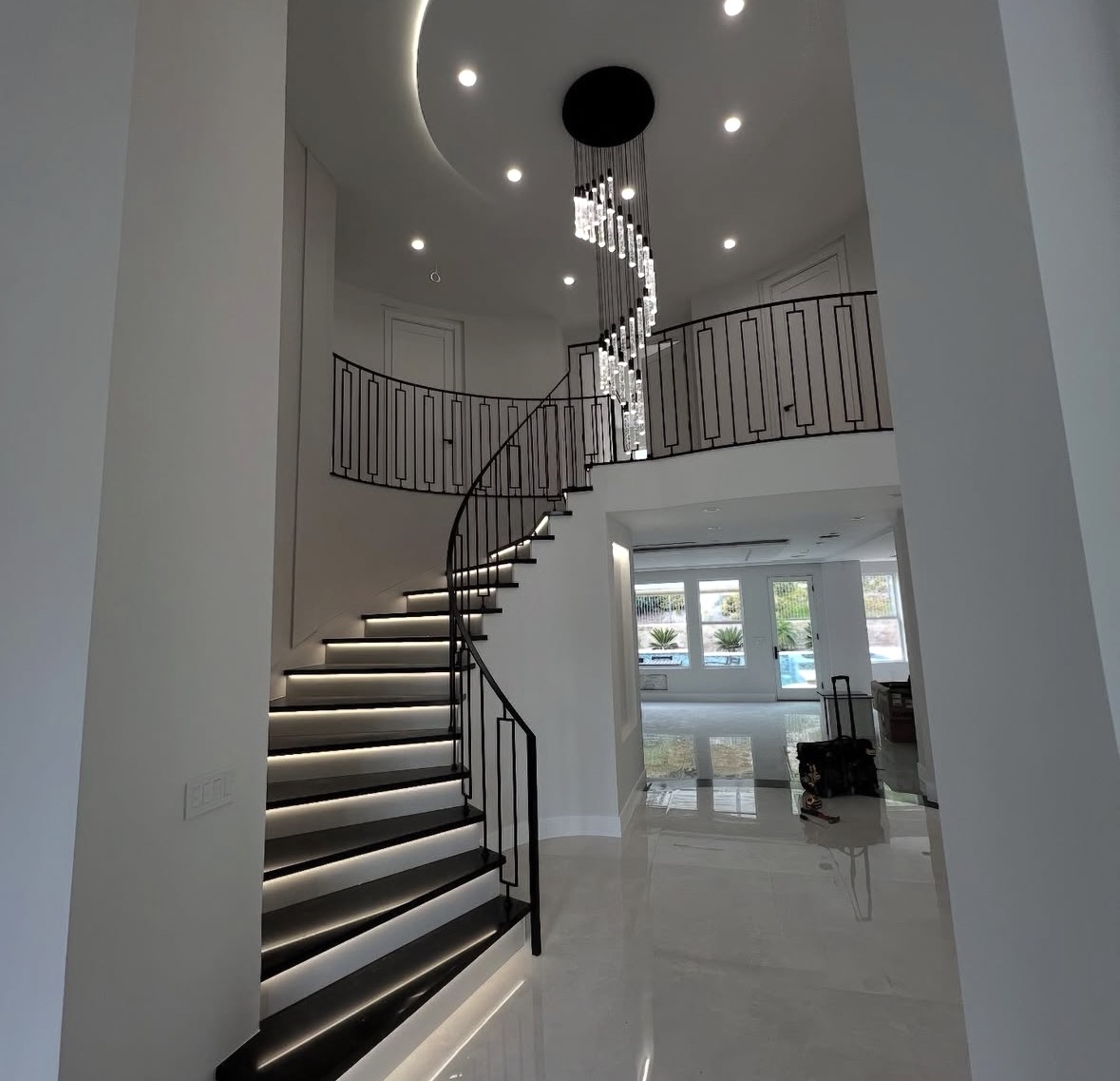 Professional chandelier mounting and dimming switch installation in a Los Feliz residence
